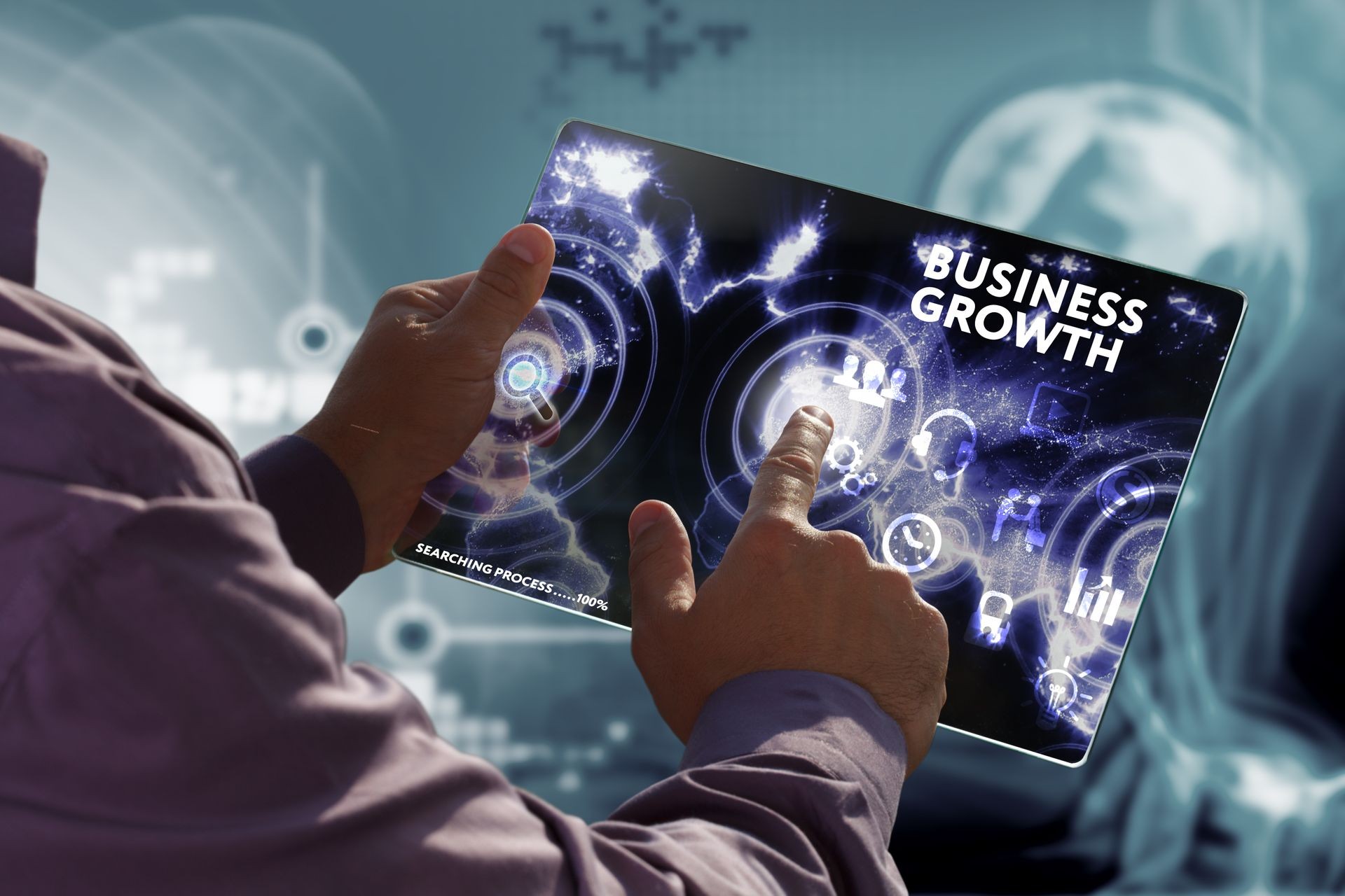 Business, Technology, Internet and network concept. Young businessman working on a virtual screen of the future and sees the inscription: Business growth Business, Technology, Internet and network concept. Young businessman working on a virtual screen of the future and sees the inscription: Business growth